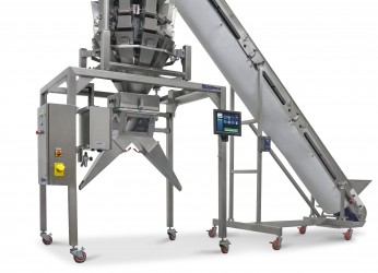 PrimoCombi dual discharge system with incline infeed conveyor for package filling