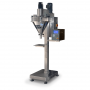 Star auger powder filling system